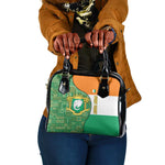 Ivory Coast Shoulder Handbag Elephant Crest and Tribal Pattern - African Pride