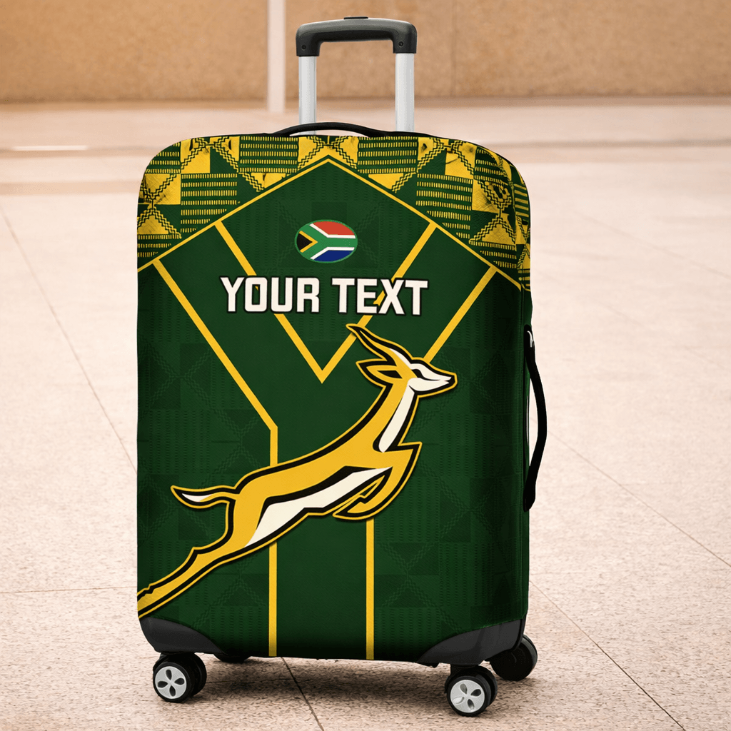 Green suitcase cover with a running antelope design and text space on a beige floor.