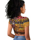 Afro Christmas in Kenya Safari Raglan Cropped T shirt Black Santa Riding Lion - African Pride
