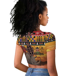 Afro Christmas in Kenya Safari Raglan Cropped T shirt Black Santa Riding Rhinoceros - African Pride
