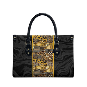 African Tribal Heritage Leather Bag Black Gold Pattern