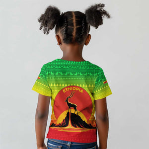 Ethiopia Christmas Kid T shirt Mountain Gazelle Sunset Ethiopian Flag - African Pride