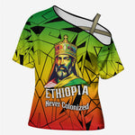 Menelik II Cross Shoulder Shirt with Crowned Portrait, Ethiopia Never Colonized Text and Pan-African Abstract - African Pride