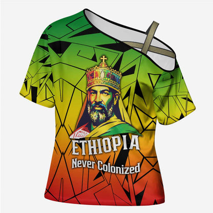 Menelik II Cross Shoulder Shirt with Crowned Portrait, Ethiopia Never Colonized Text and Pan-African Abstract - African Pride