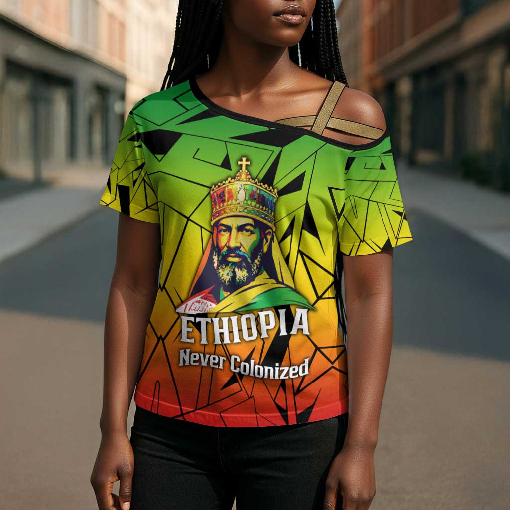 Menelik II Cross Shoulder Shirt with Crowned Portrait, Ethiopia Never Colonized Text and Pan-African Abstract - African Pride