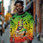 Menelik II Long Sleeve Shirt with Crowned Portrait, Ethiopia Never Colonized Text and Pan-African Abstract - African Pride