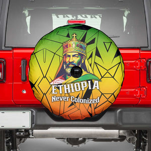 Menelik II Spare Tire Cover with Crowned Portrait, Ethiopia Never Colonized Text and Pan-African Abstract - African Pride