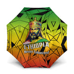 Menelik II Umbrella with Crowned Portrait, Ethiopia Never Colonized Text and Pan-African Abstract - African Pride