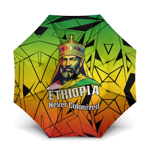 Menelik II Umbrella with Crowned Portrait, Ethiopia Never Colonized Text and Pan-African Abstract - African Pride