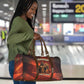 Taharqa Travel Bag with Warrior Portrait, Lion of Kush Title and Bold Red Defender of Africa - African Pride