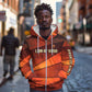 Taharqa Zip Hoodie with Warrior Portrait, Lion of Kush Title and Bold Red Defender of Africa - African Pride