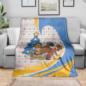 Somalia Christmas Blanket Santa Cheetah Christmas Tree Village Scene and Festive Snowflake - African Pride