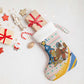Somalia Christmas Stocking Santa Cheetah Christmas Tree Village Scene and Festive Snowflake - African Pride