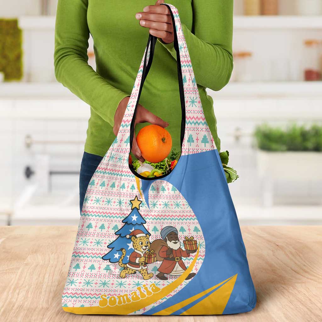 Somalia Christmas Grocery Bag Santa Cheetah Christmas Tree Village Scene and Festive Snowflake - African Pride
