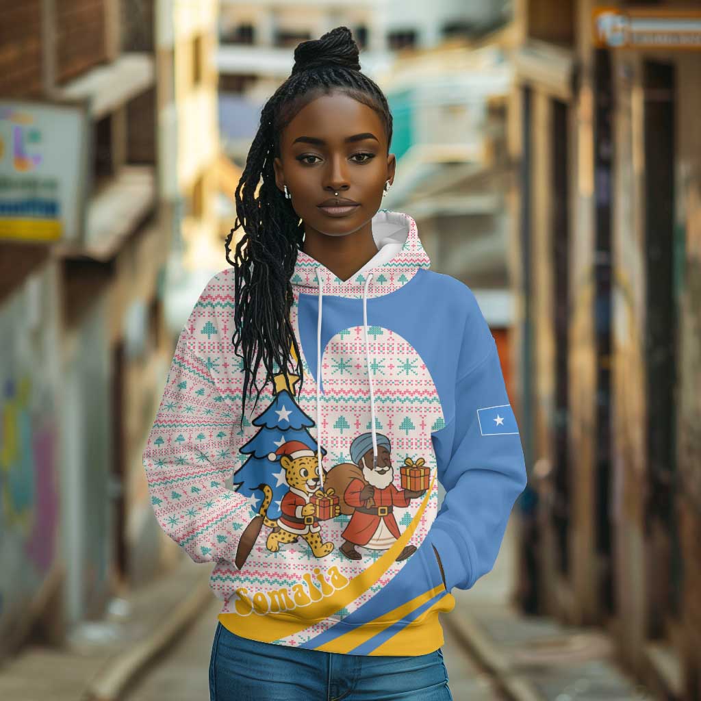 Somalia Christmas Hoodie Santa Cheetah Christmas Tree Village Scene and Festive Snowflake - African Pride