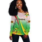 Vibe Zimbabwe Off Shoulder Sweater Tribal-Inspired Background with Geometric Flag Color Design
