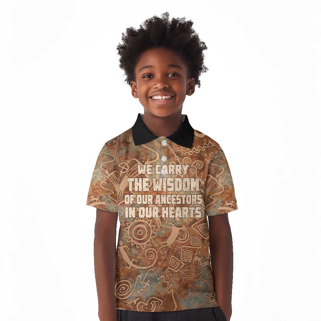 We Carry The Wisdom Kid Polo Shirt Indigenous Spirit Quote Art - African Pride