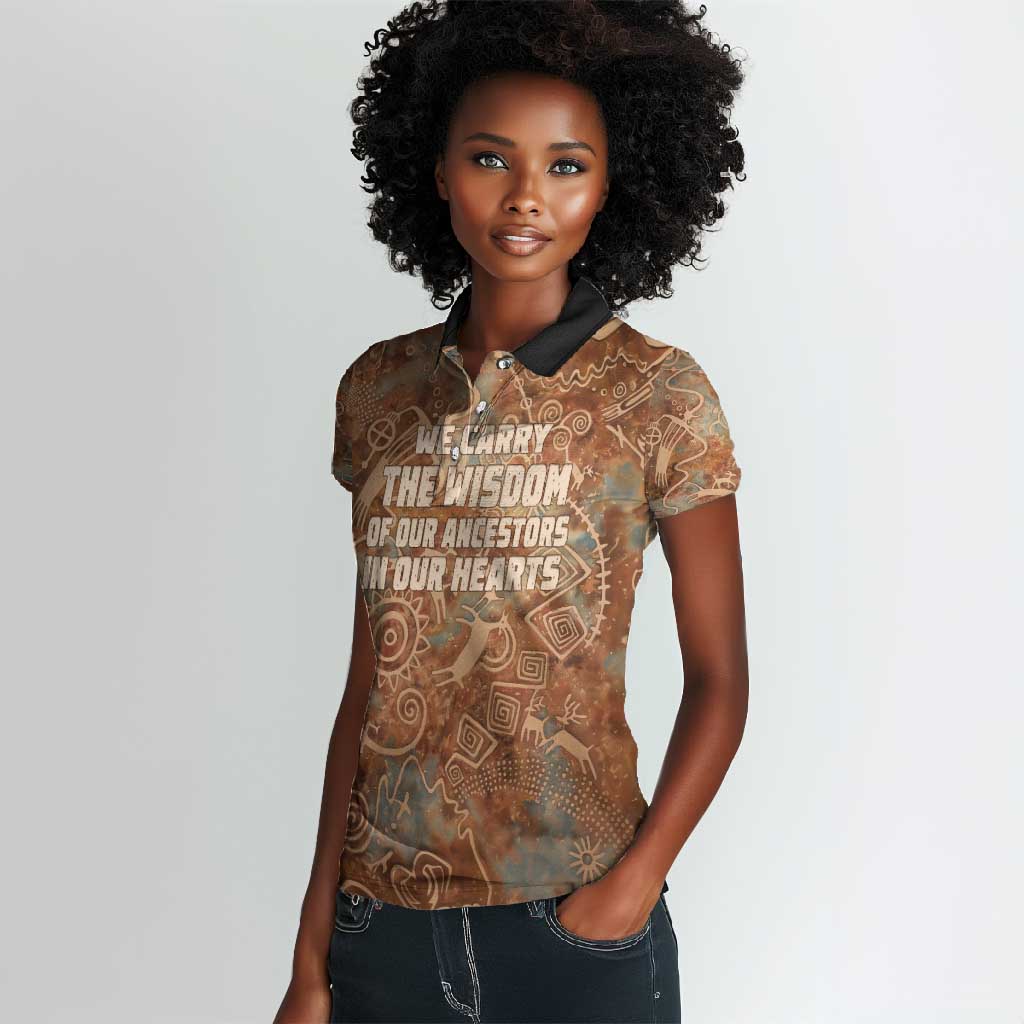 We Carry The Wisdom Women Polo Shirt Indigenous Spirit Quote Art - African Pride