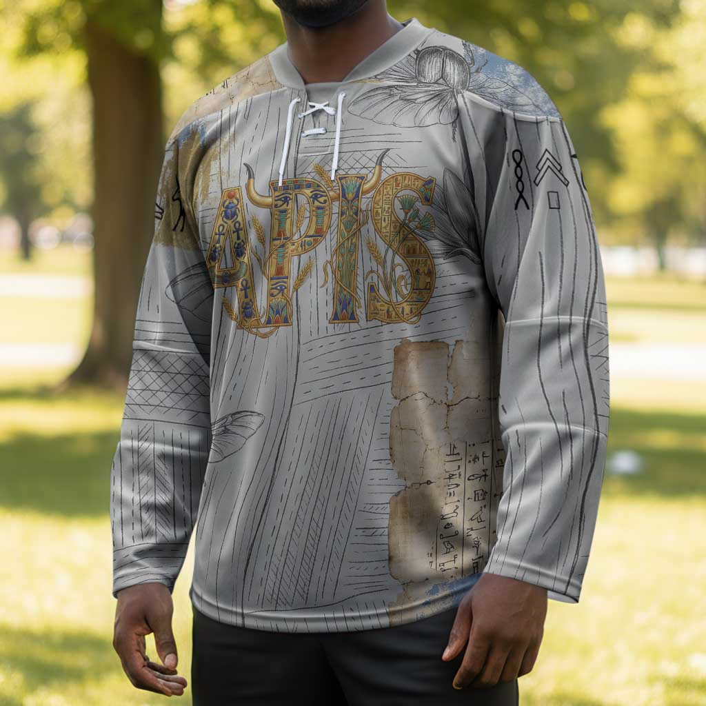 Apis Ancient Egyptian Hockey Jersey with Beige-Gray Hieroglyphic, Ornate Bull Head, and Gold-Blue Typography - African Pride