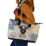 Apis Ancient Egyptian Leather Tote Bag with Beige-Gray Hieroglyphic, Ornate Bull Head, and Gold-Blue Typography - African Pride