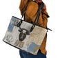 Apis Ancient Egyptian Leather Tote Bag with Beige-Gray Hieroglyphic, Ornate Bull Head, and Gold-Blue Typography - African Pride