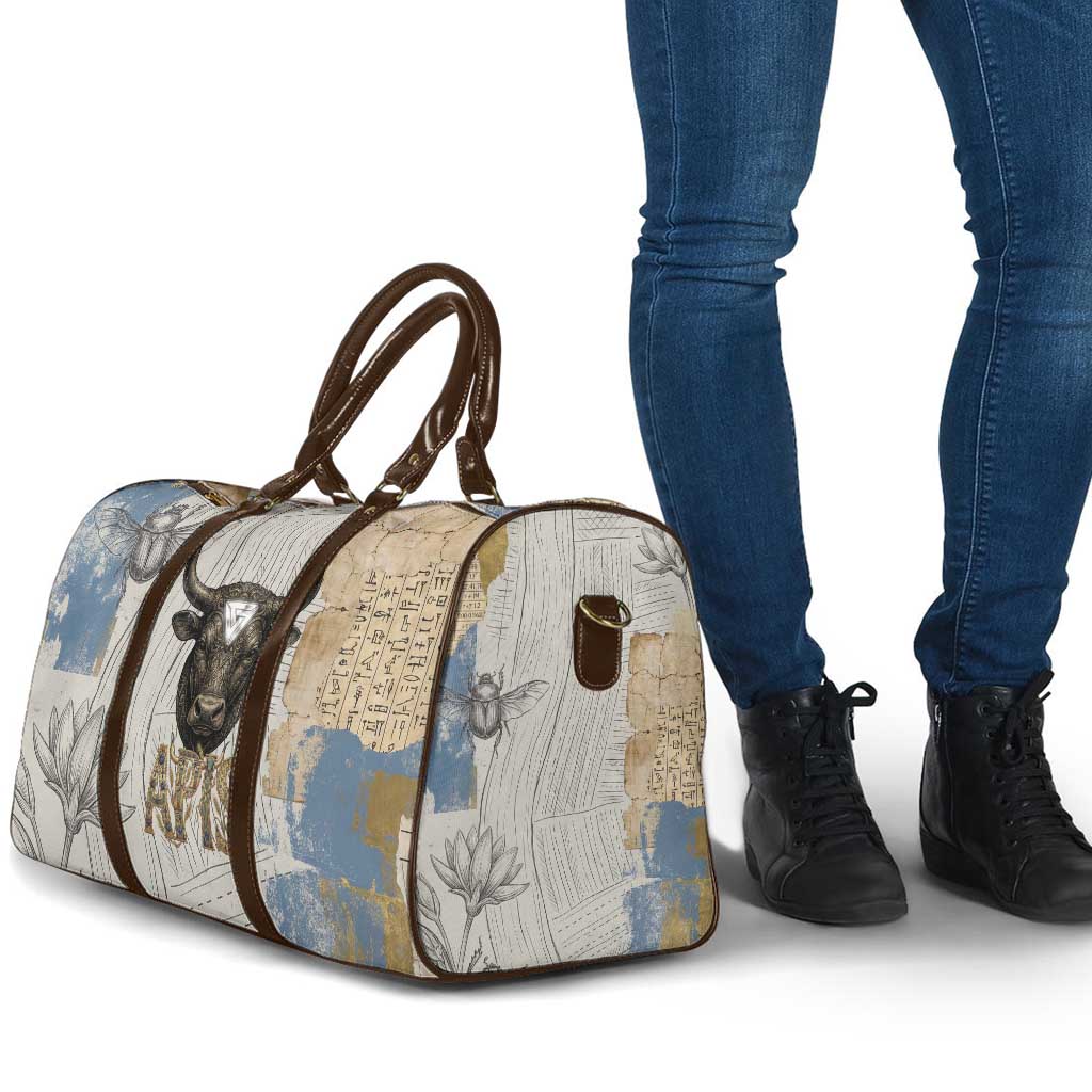 Apis Ancient Egyptian Travel Bag with Beige-Gray Hieroglyphic, Ornate Bull Head, and Gold-Blue Typography - African Pride